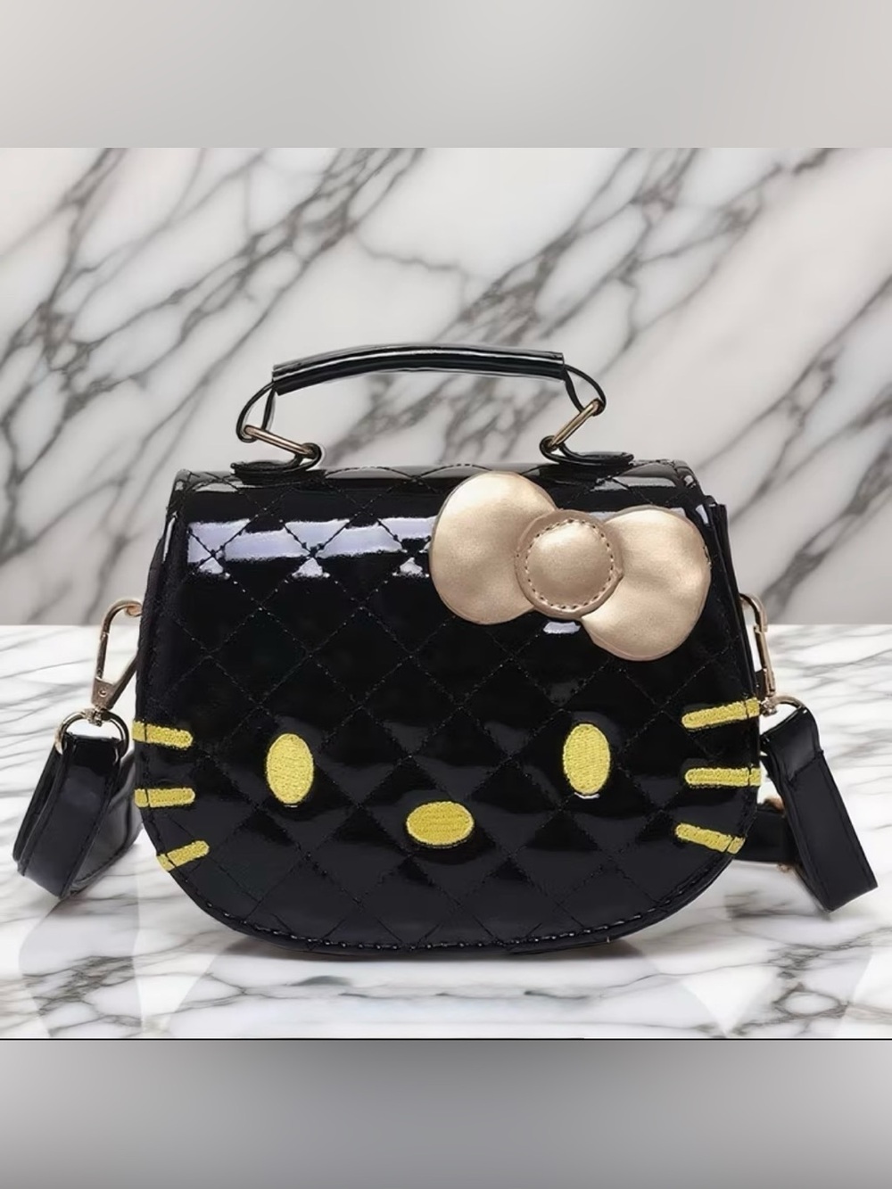 Hello Kitty Black Quilted Patent Crossbody Bag with Gold Bow Accent